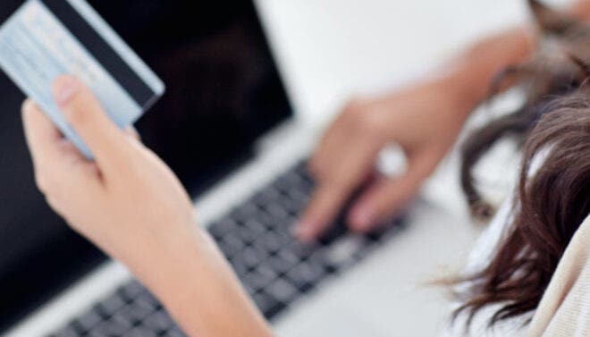 Woman holding credit card